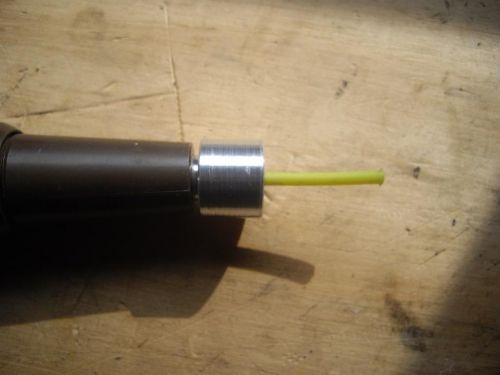 Shock tube adaptor for grip switch